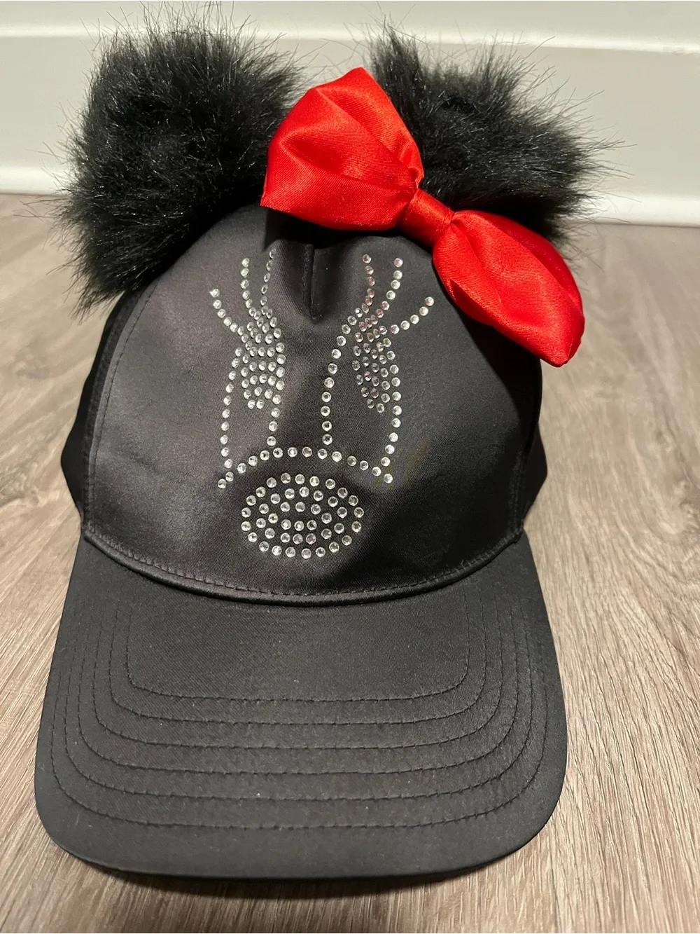 Disney Parks Black Faux Fur Ear Cap with Red Bow and Rhinestones NWOT